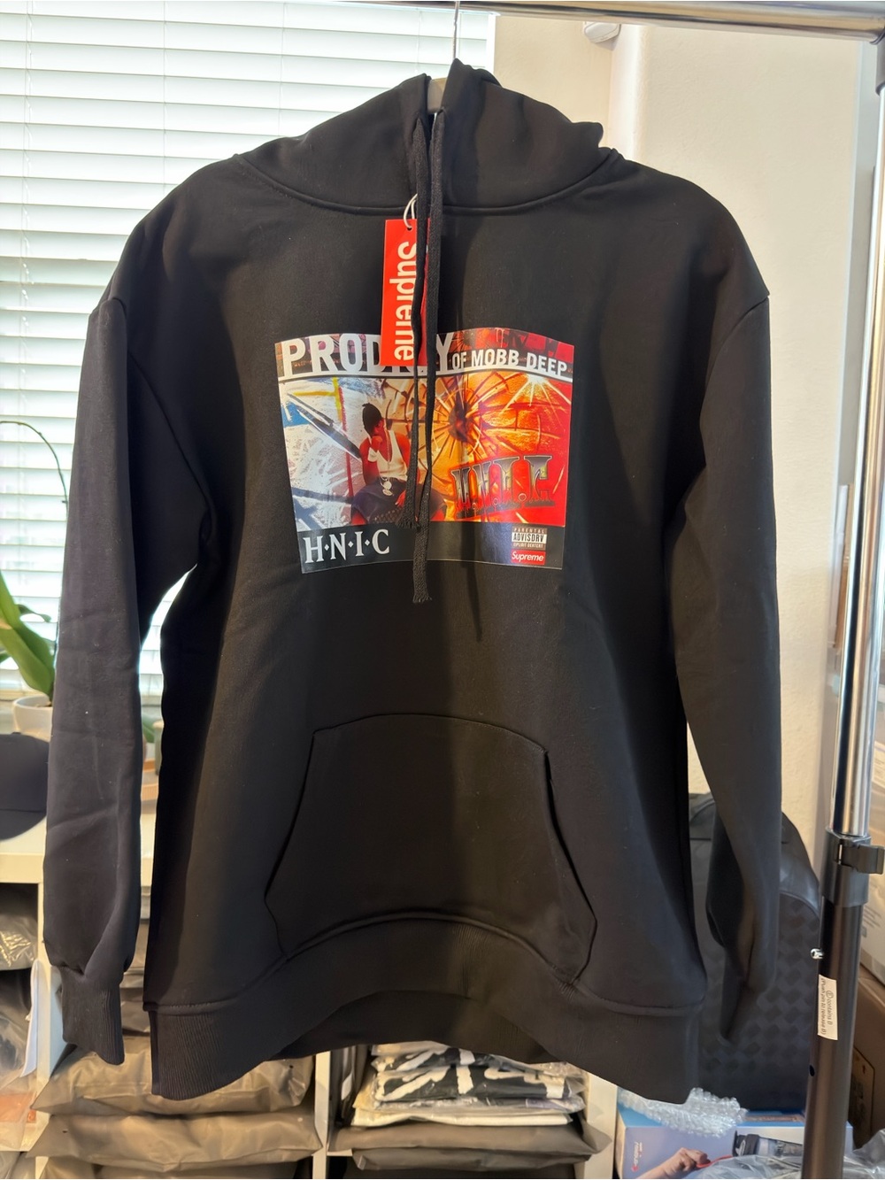Supreme Black Hoodie with Multi-Color Chest Graphic